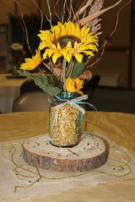 Flowers form an essential part of any outdoor country wedding. Pin by Robyn Smith on Pat & Andrea's Reception | Sunflower ...