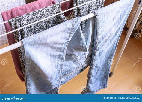 Clothes Hung On The Clothes Dryer Indoors Stock Photo Image Of