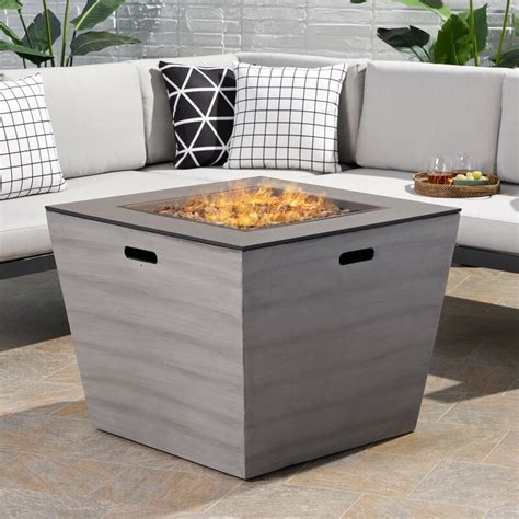 The peaktop 36 outdoor round propane gas fire pit with concrete base features sturdy concrete construction, preventing it from cracking or tipping even in harsh weather conditions. Ebern Designs Ainsley Outdoor Modern Concrete Propane Fire Pit Table & Reviews | Wayfair