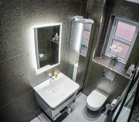 In some parts of the world, a toilet is typically included in the bathroom; Install - Cheshire Tiling & Bathrooms