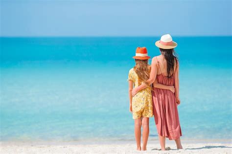 Premium Photo Beautiful Mother And Daughter On The Beach