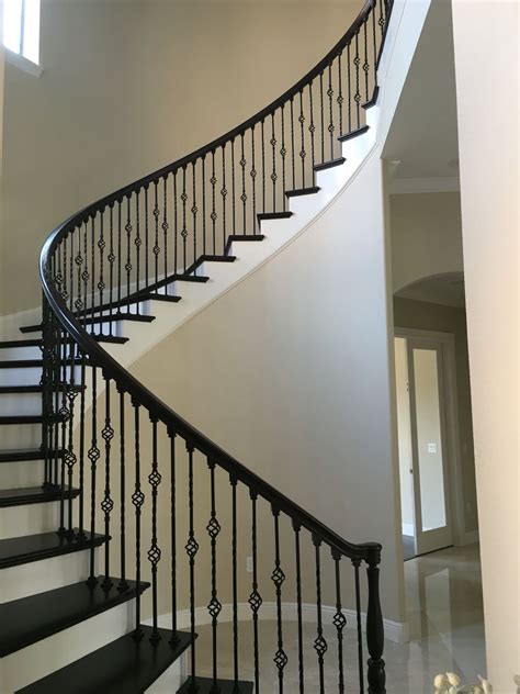 Maybe you would like to learn more about one of these? Stained oak spiral staircase | Diy staircase railing, Steel railing design, Wrought iron stair ...