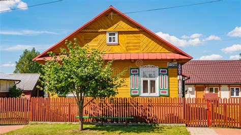 Traditional Old Wooden Polish Rural House In The Village Of Trzescianka
