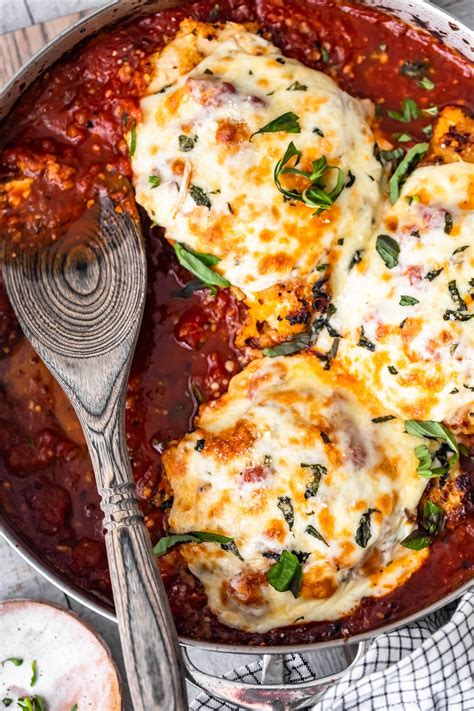 The mouthwatering dish is easy to prepare and features some of our favorite comfort foods: breaded chicken breasts in a skillet filled with marinara ...