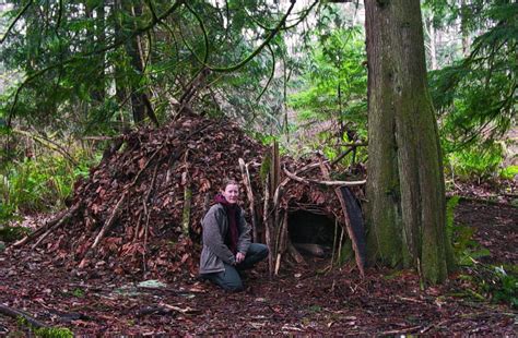 how to build a survival shelter sleeping outside in a primitive survival shelter with no tent