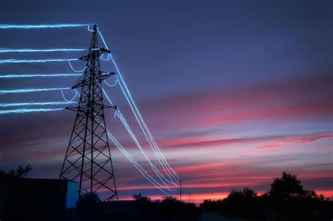 Premium Photo Electricity Transmission Towers With Glowing Wires