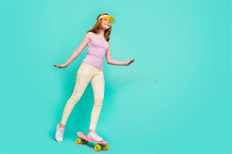 Full Length Body Size Photo Girl Wearing Cap Riding On Longboard