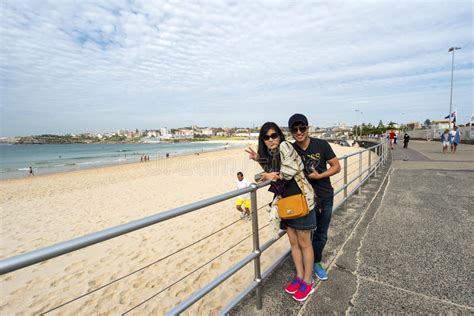 Two Asian Tourists At Bondi Beach Editorial Image Image Of Pavement