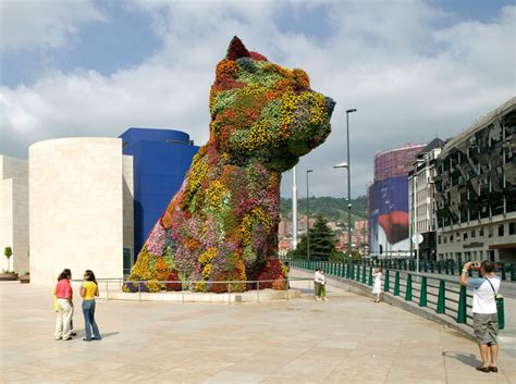 Installation view of jeff koons, string of puppies , 1988, at the whitney museum of american art. In full bloom: Jeff Koons's Puppy | Art and design | The ...