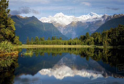 Mount Tasman And Aoraki Mount Cook Reflected In Lake Matheson South