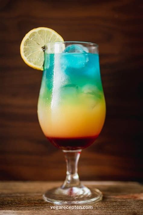 Rainbow Paradise Cocktail With Blue Curacao Vega Recepten Recipe Cocktails With Blue
