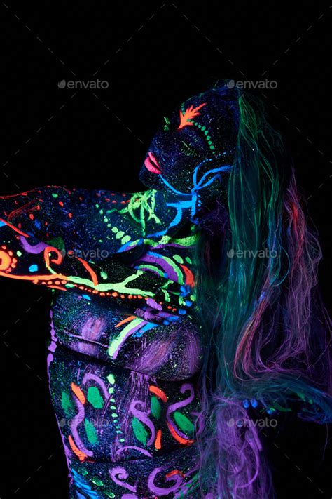 Woman Body Art Body Dancing In Ultraviolet Light Bright Abstract Drawings On Woman Body Neon