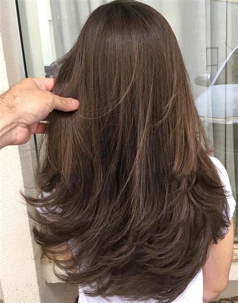 Mid Length Feather Hair Style Wavy Haircut