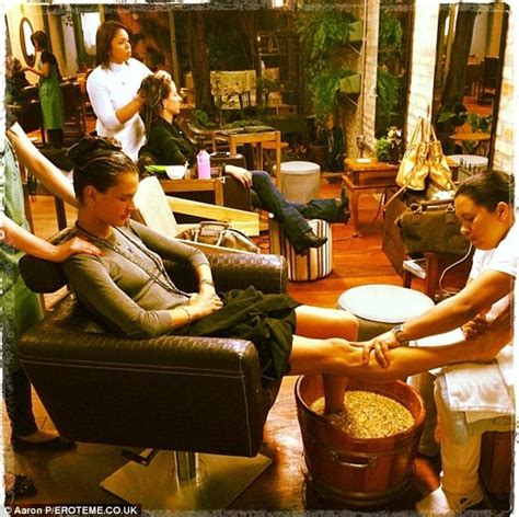 alessandra ambrosio unwinds with a relaxing shoulder and foot massage in her native brazil
