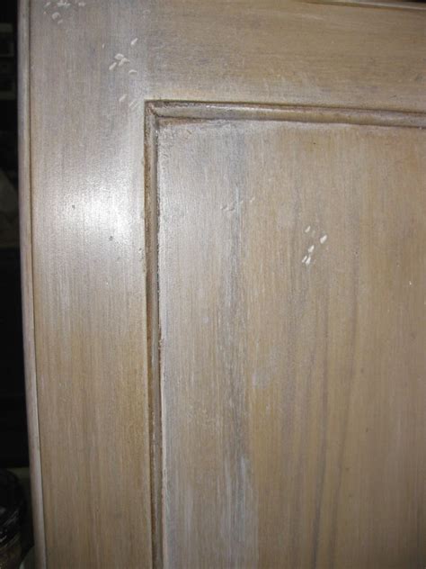 Since stains and smudges stand out visually on a bright solid white surface, whitewashed cabinets may require less frequent cleaning and dusting than a pure white kitchen. Finishing Acts: February 2012 | Oak cabinets, Stained ...