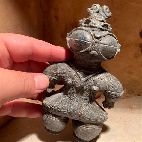 Dogu statue Japanese sculpture Jomon art. Ancient aliens / Chariots of