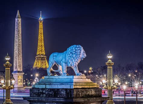 The eiffel tower is located on the champs de mars at 5 avenue anatole france in the 7th arrondissement of paris. france, Sculptures, Lions, Paris, Night, Street, Lights ...