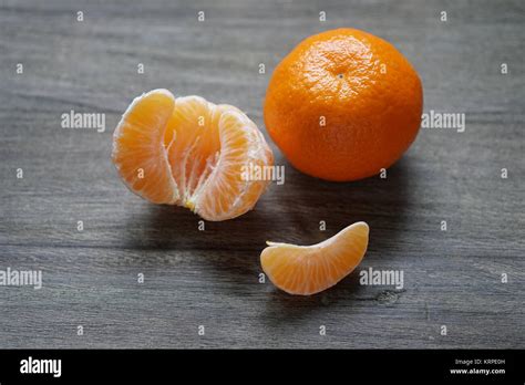 Clementines Or Mandarin Oranges On Rustic Wooden Table Stock Photo Alamy