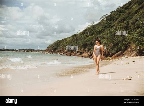 Sri Lanka Southern Province Galle Adult Woman Walking Along Sandy Coastal Beach In Summer