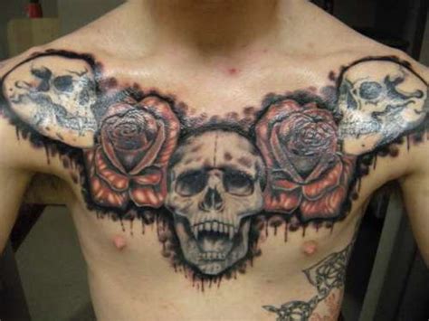 Skulls With Roses Tattoo On Man Chest