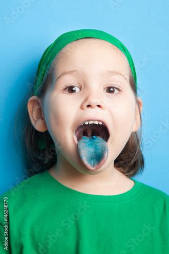 Little Girl With Blue Tongue Stock Photo And Royalty Free Images On