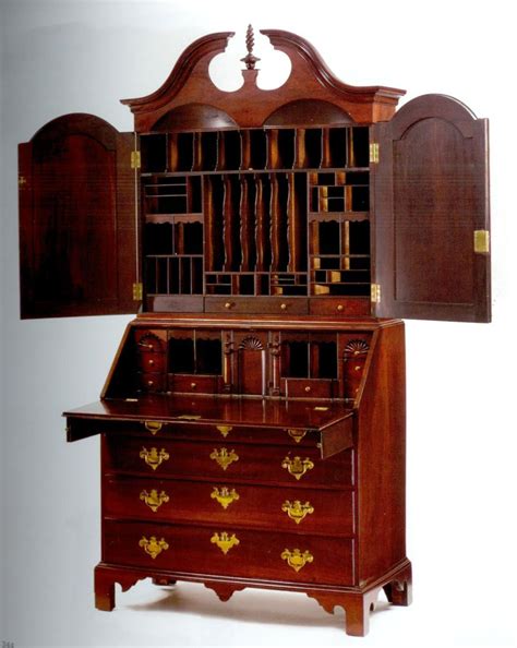 A Chippendale Carved And Figured Mahogany Desk And Bookcase Labeled