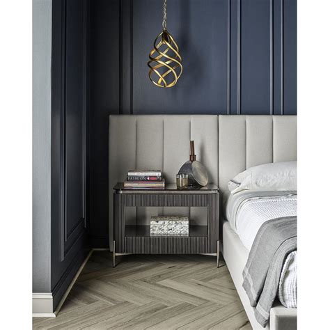 Add a hint of retro style above your kitchen island, nightstand, or entryway with this pendant light. Dante Modern Classic Black Glass Top Ridged Metal Nightstand