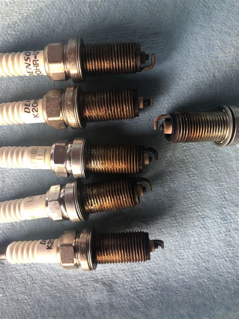Advice Do These Old Spark Plugs Appear To Have Normal Wear Or A Sign