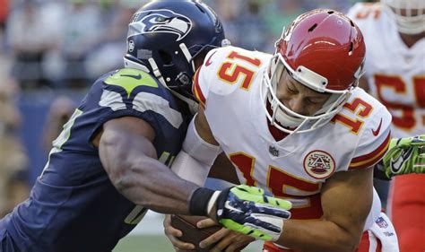 seahawks promote garrison smith waive david bass profootballtalk