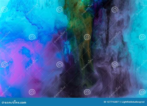 Creative Texture With Purple And Blue Paint Swirls In Water Stock Image