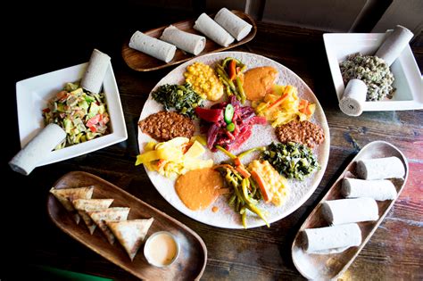 እንጀራ), a large sourdough flatbread, which is about 50 centimeters (20 inches) in diameter and made out of fermented teff flour. Ethiopian Cuisine with Injera Kitchen - #LiveMarley ...