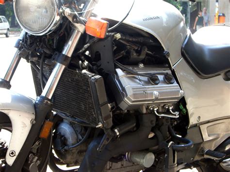 What we saw coming was the new styling, with a vertically stacked headlight to match its 1,000cc big. V4 engine - Tractor & Construction Plant Wiki - The ...