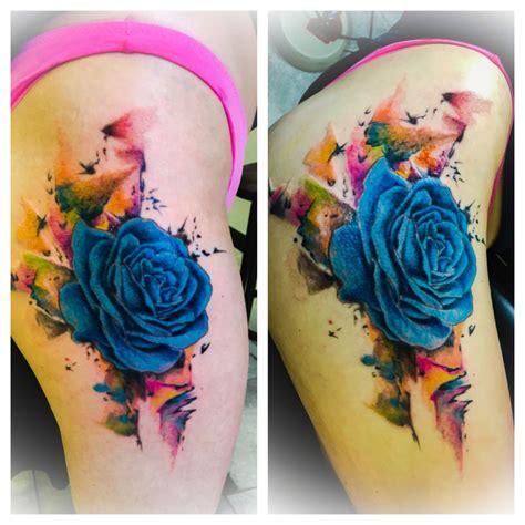 A bouquet of flowers is a perfect tattoo idea. Watercolor rose hip piece | Blue rose tattoos, Rose ...