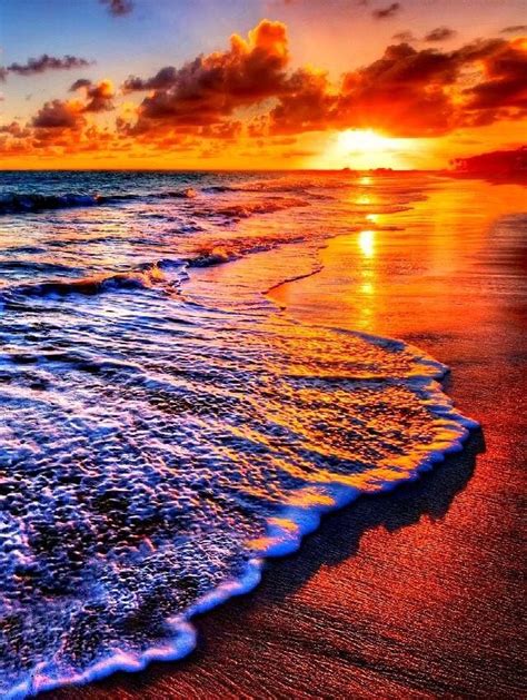 A Breathtaking Sunset On A Beautiful Beach Sunrise