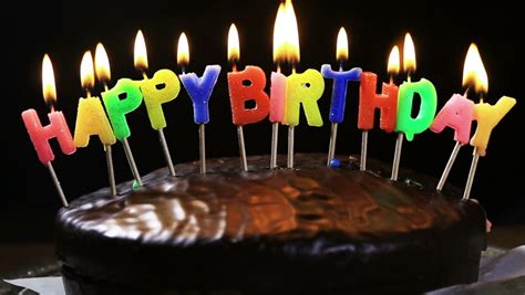 Festive Candles Happy Birthday On A Cake Stock Footage Video 12026402