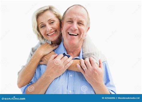 Happy Mature Couple Embracing Smiling At Camera Stock Photo Image Of