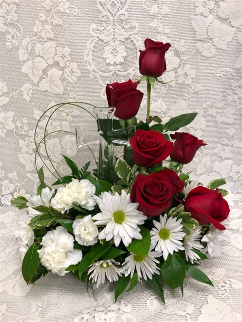 We encourage you to connect with and support these committed, passionate artisans in your. Lasting Cross Bouquet in Jackson, MI | Karmays Flowers & Gifts