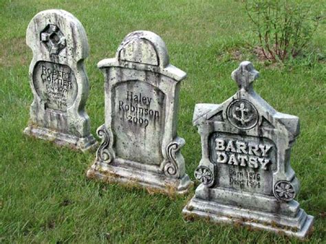 creepy headstones made of foam and sculpted with hot wire foam factory tools by robert beech of