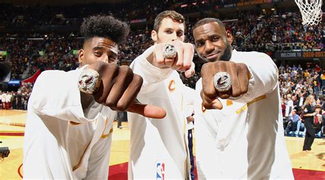 The logo is designed in garnett. How Cavs fans got a chance to try on championship rings ...
