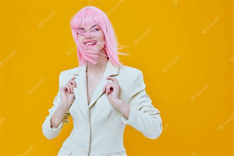 Premium Photo Cheerful Woman On Yellow Background With Pink Hair Glamor