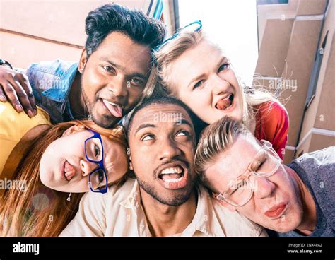 Multiracial Millenial Friends Taking Selfie Sticking Out Tongue With Funny Faces Happy