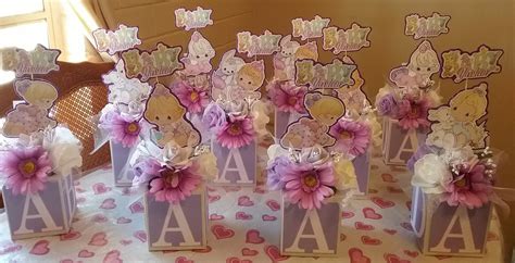 A baby shower usually runs two to three hours, with the meal and when do you send baby shower invites? Baby shower centerpieces Precious Moments | Baby shower ...