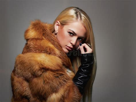 winter woman in luxury fur coat beauty fashion model girl stock image