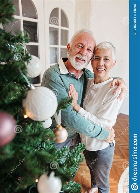 But whether it's a parent, friend or relative, they usually have everything they need and they may be so, let us help you with our list of the best gifts we have given to our aging parents, friends and relatives for christmas! Elderly Couple Decorating A Christmas Tree Stock Photo ...