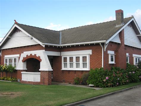 They usually have a flat front and a small covered porch. A Large Red Brick Arts and Crafts Style Bungalow - Coburg ...