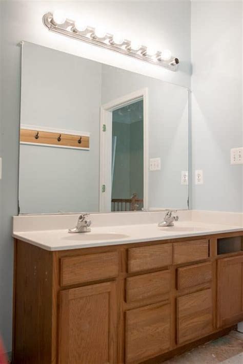 Allow to dry properly and test for adhesion. Painted Bathroom Cabinet Update - Midnight Blue | Painting ...