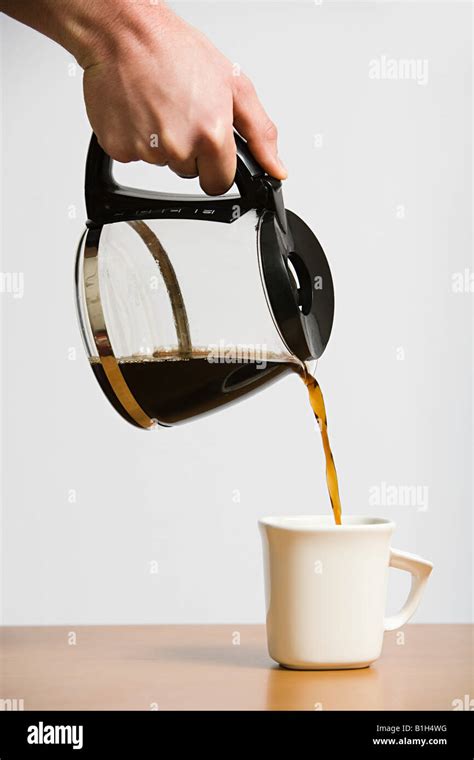 Person Pouring Coffee Stock Photo Alamy