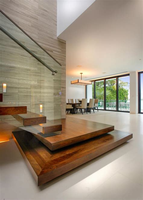 Modern Staircase With Floating Wood Steps And Glass Railing Hgtv
