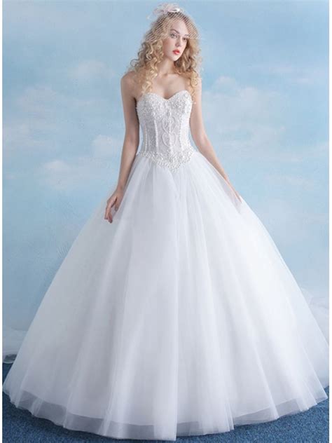 White one presenta una collezione di abiti da sposa chic che ti faranno sentire splendida per il tuo grande giorno. Abito da Sposa Principesco con gonna in tulle e corpetto ...