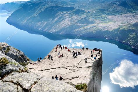 Want a total preikestolen (pulpit rock) experience? Cliff Preikestolen at fjord Lysefjord — Stock Photo ...